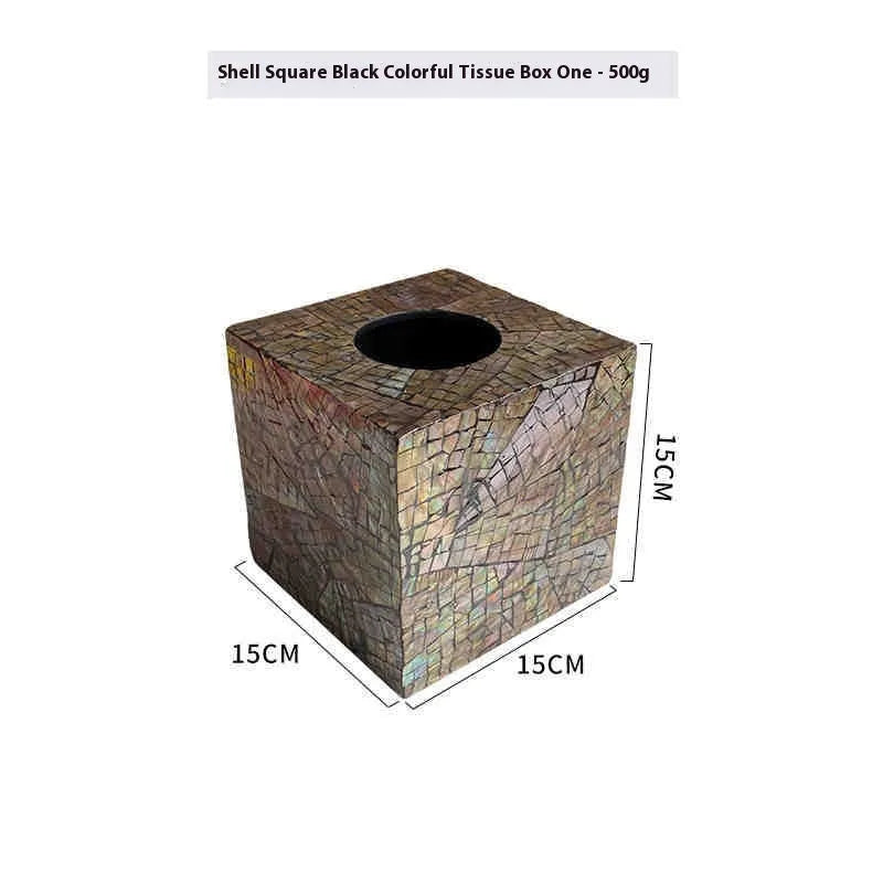 Black rectangular natural shell tissue box storage container with removable insert on a table.