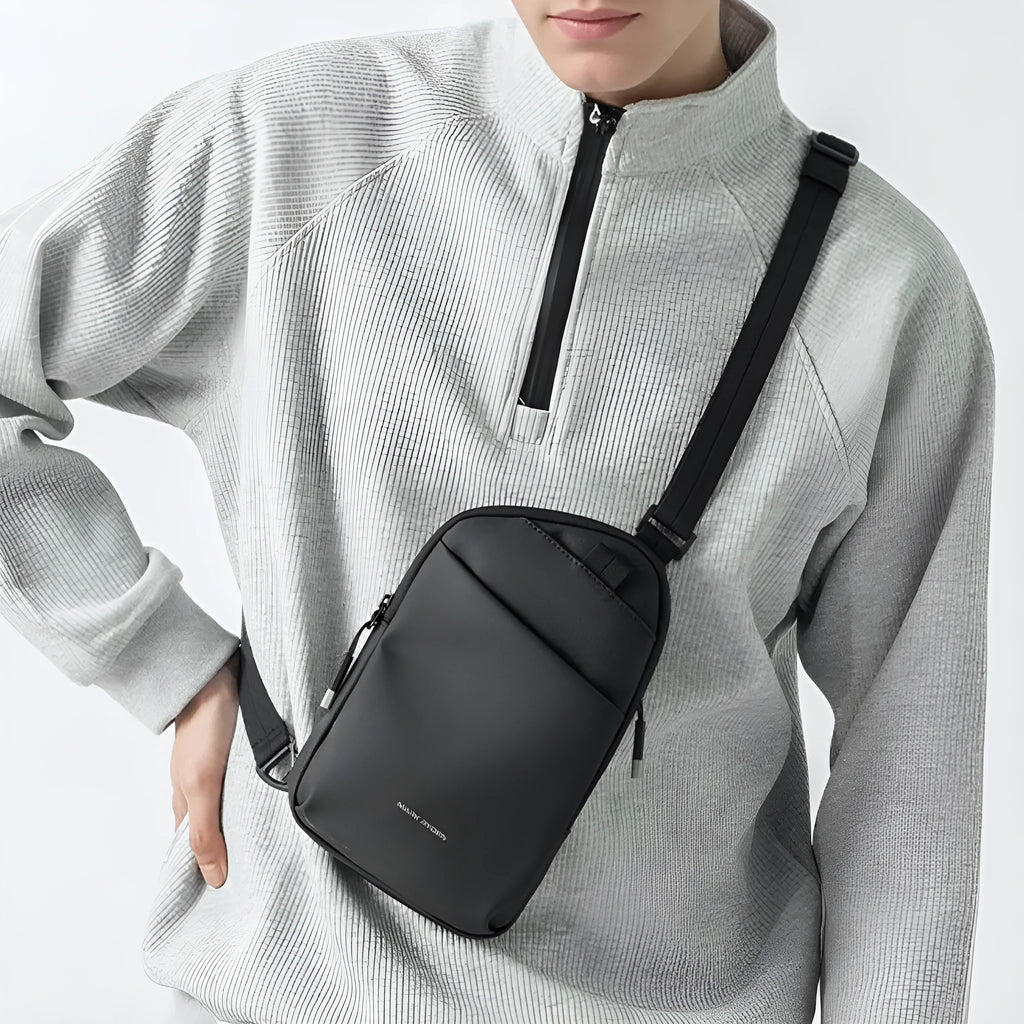 Men's elegant black Oxford cloth crossbody bag shown from the front.
