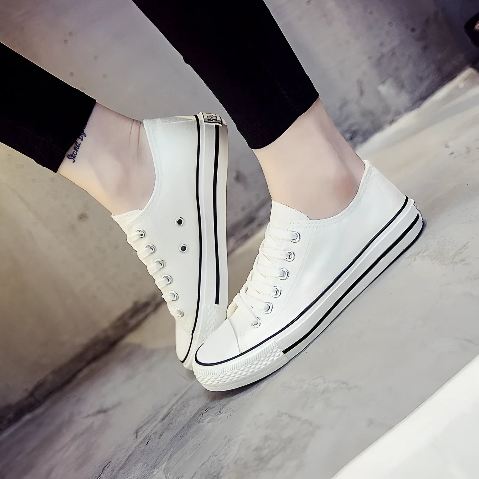 Women's canvas shoes in solid colours including black, white-black, white-red, and all-black variations