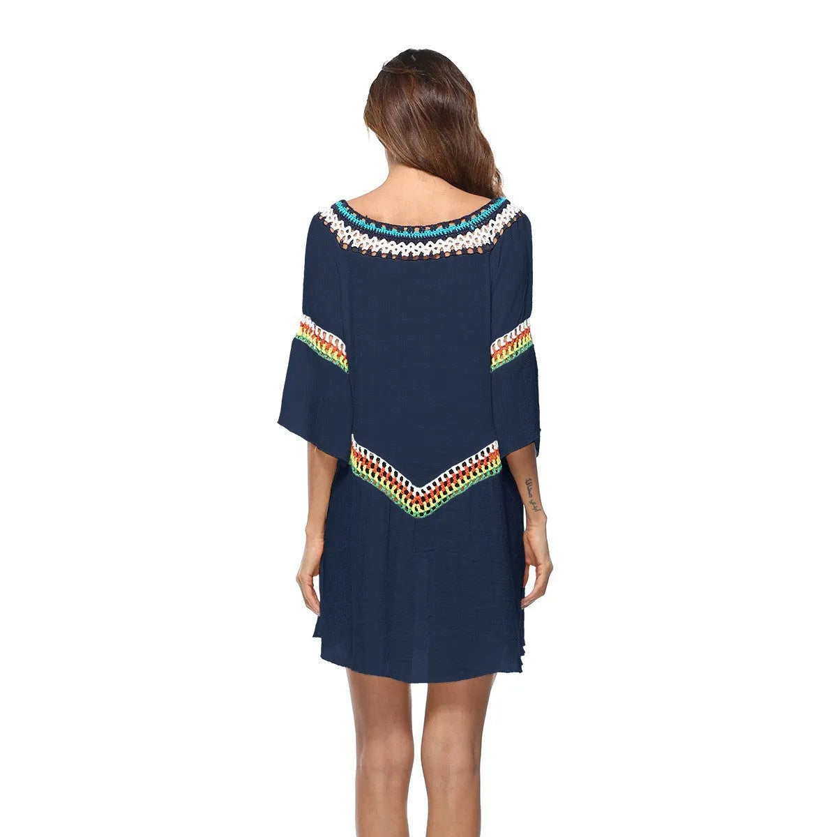 Crocheted ethnic style women's sun protection clothing in apricot colour for beach wear.