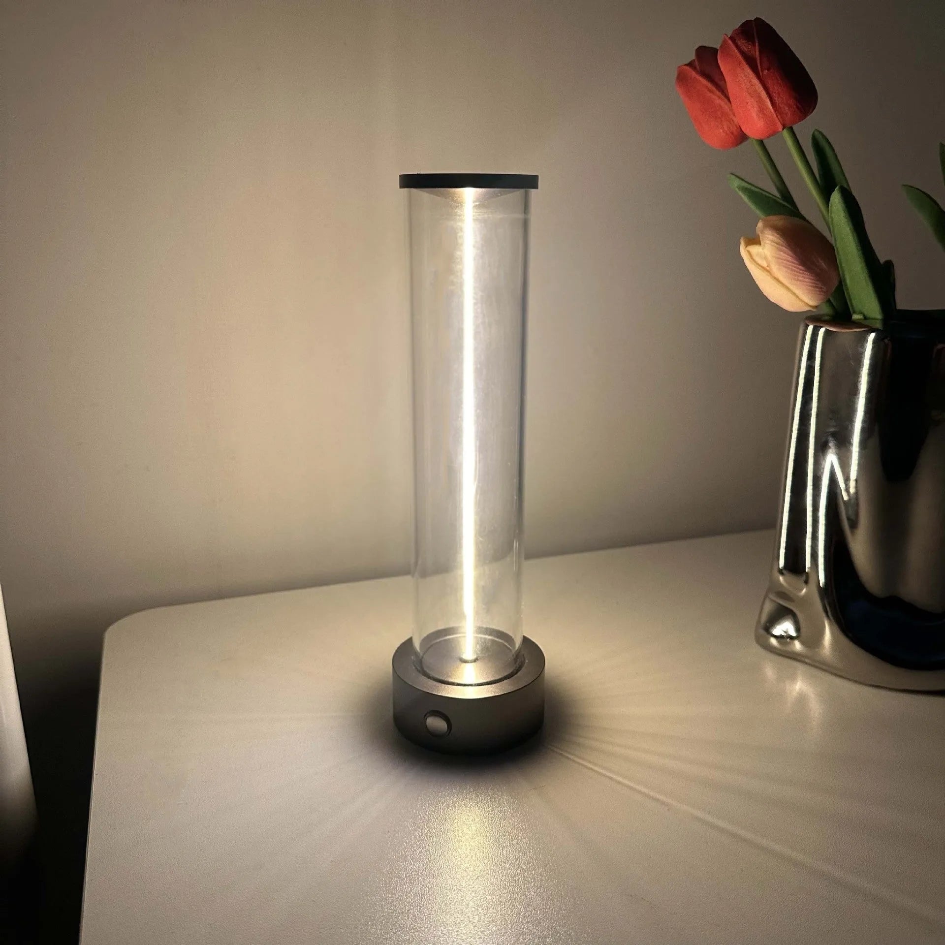 Modern white glass LED line light with magnetic base for USB rechargeable accent lighting