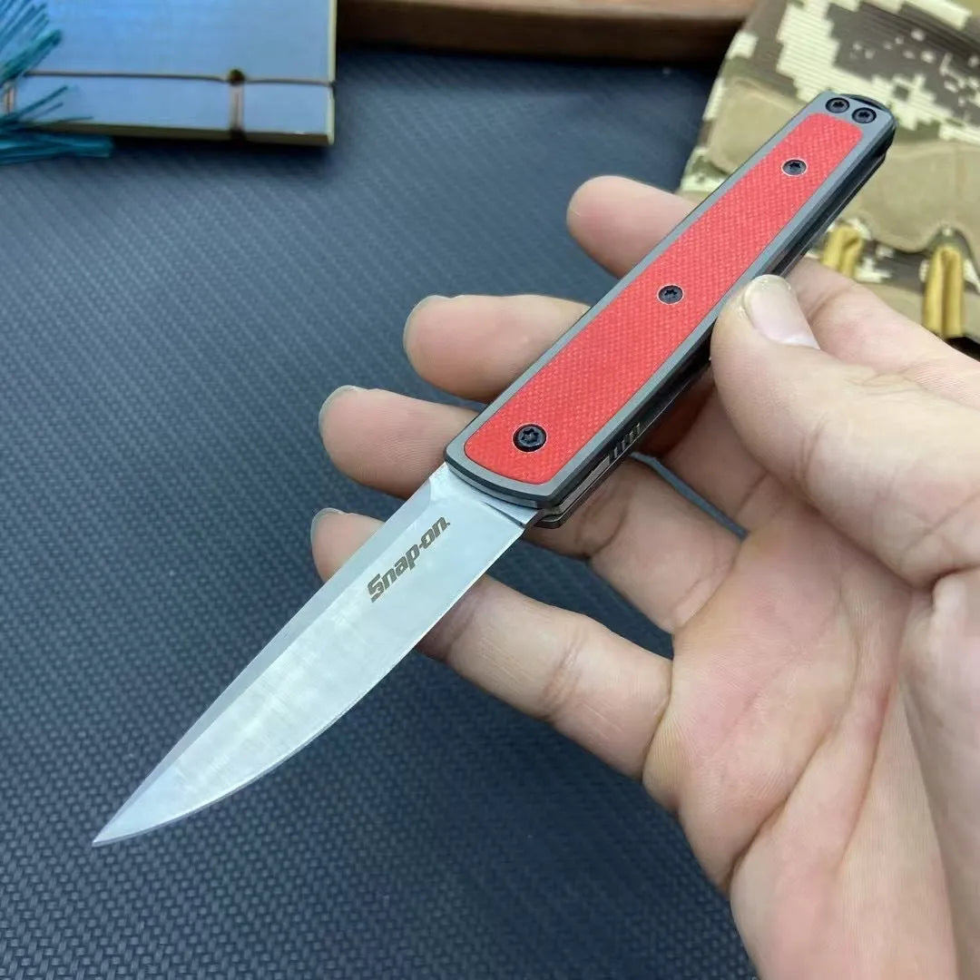 Folding fruit knife with stainless steel blade shown open, demonstrating 17cm total length