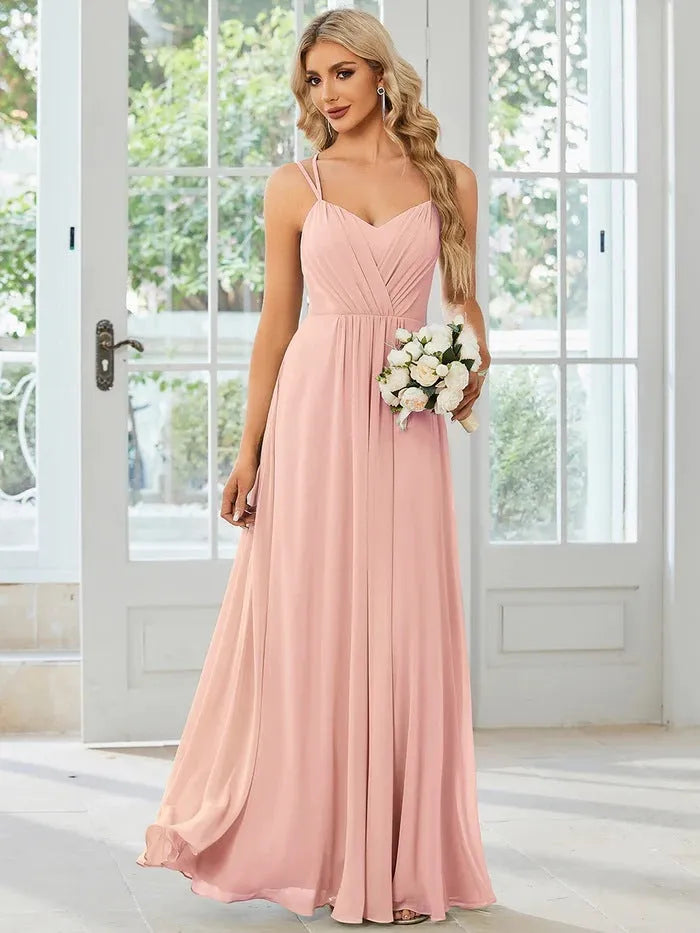 Women's sleeveless long A-line pleated dress in solid colour polyester fabric