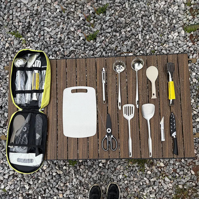 12-piece stainless steel portable picnic kitchenware set in a khaki storage bag.