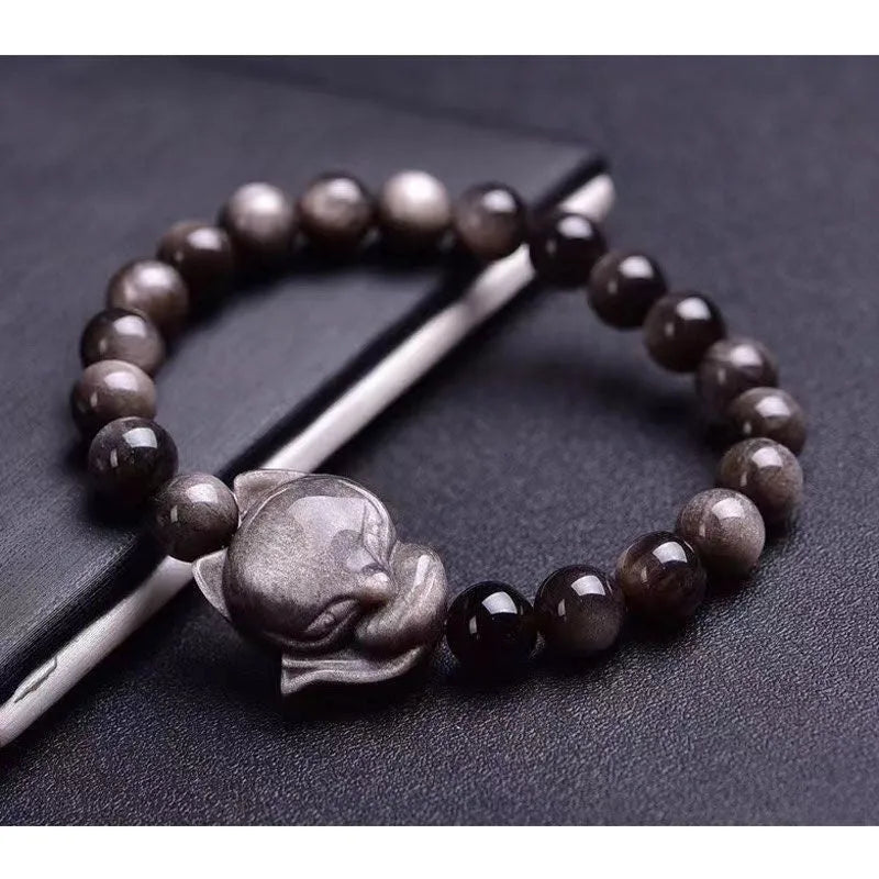 Obsidian fox charm bracelet with adjustable leather cord and sliding knot closure