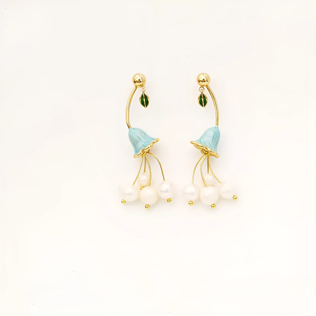 Natural baroque pearl ear studs in lily flower shape with gold plating on copper base