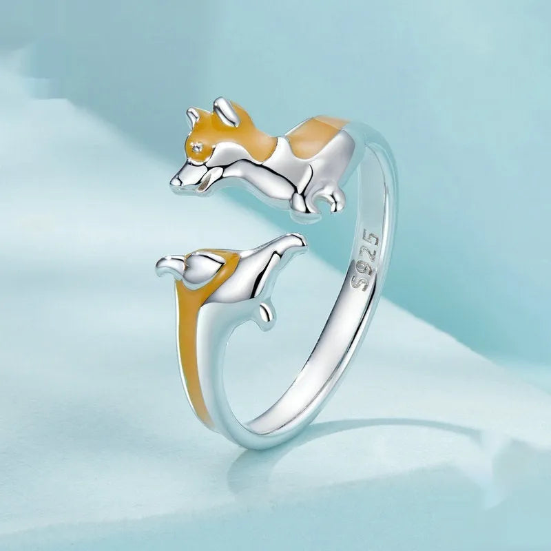 Silver electroplated fashion ring with a cute cartoon corgi dog design on it.