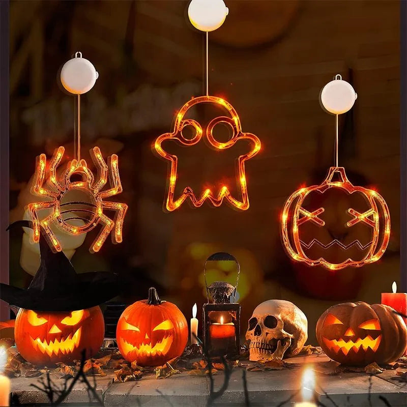 Halloween window hanging LED lights with suction cups showing multiple horror-themed designs powered by batteries