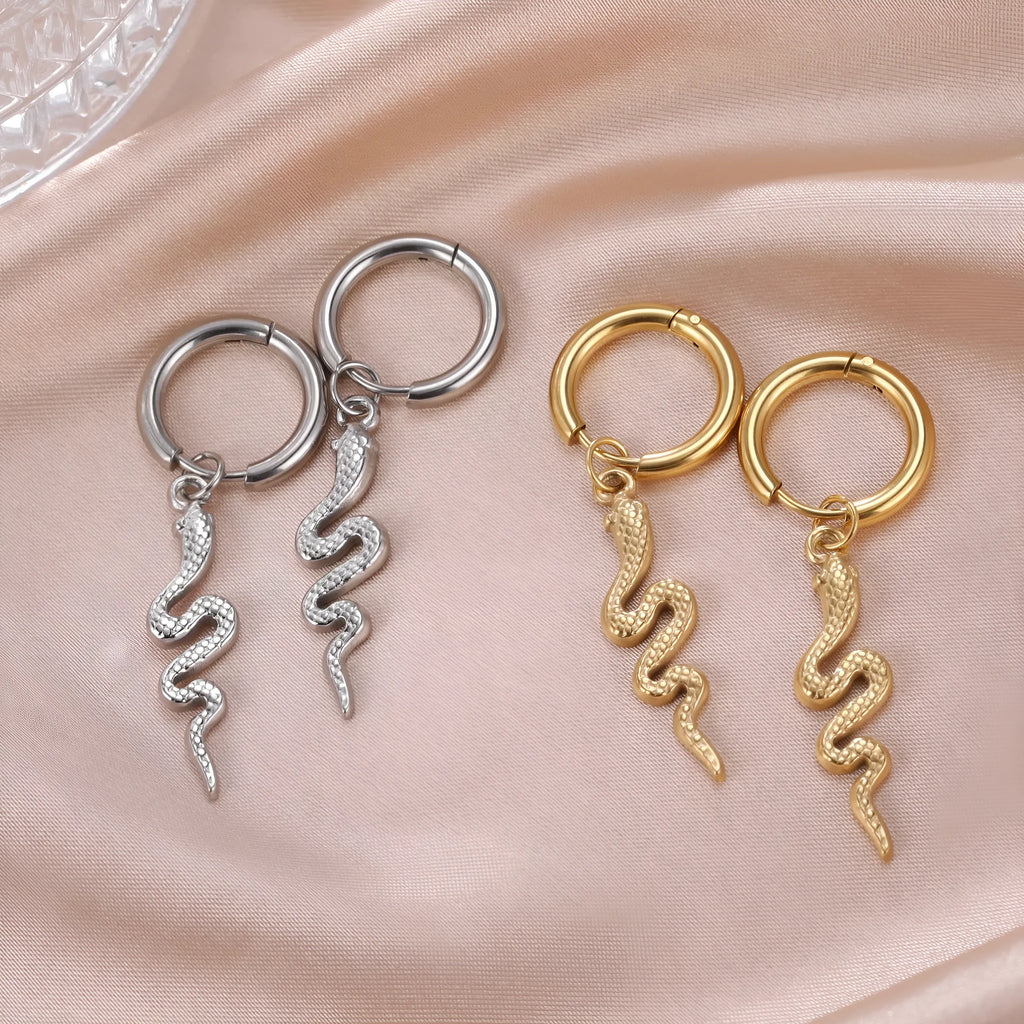 Gold plated stainless steel snake-shaped vintage clip earrings with Zodiac design