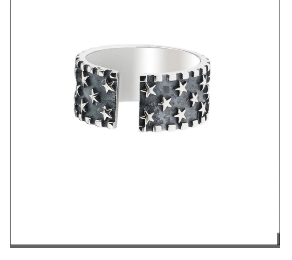 Five pointed star geometric ring made from 925 silver with an adjustable open band.