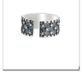 Five pointed star geometric ring made from 925 silver with an adjustable open band.