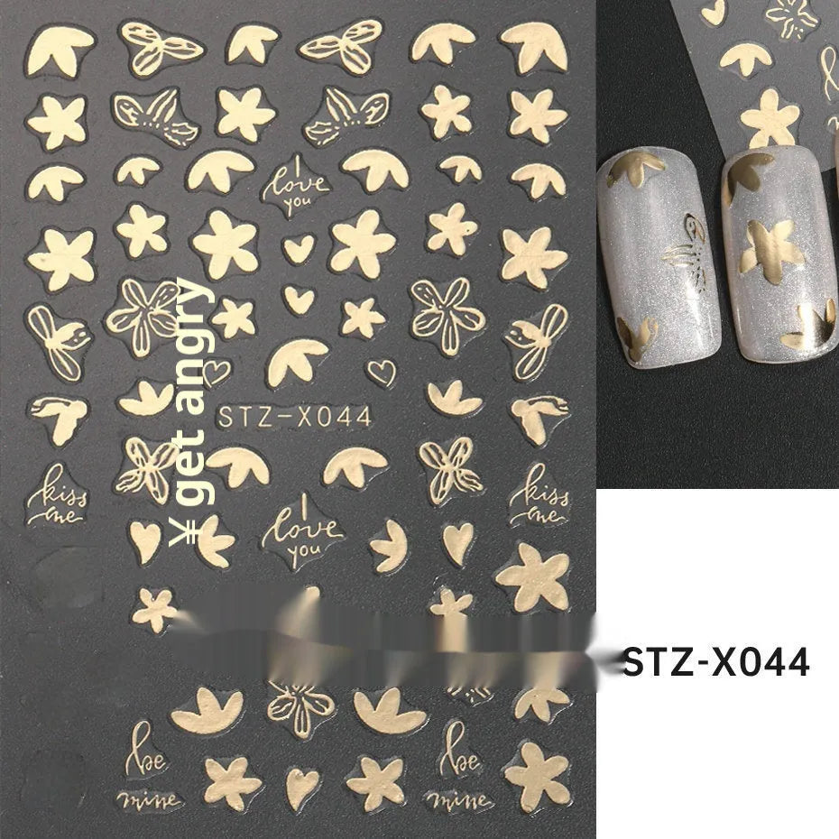 Sheet of black and silver love heart pattern nail art stickers with a plastic nail patch.