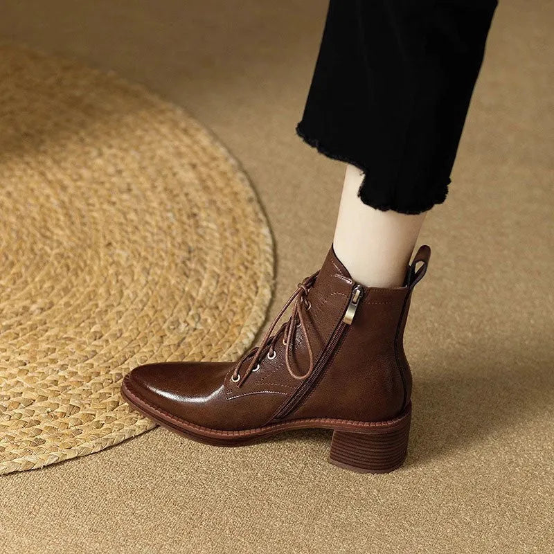 Women's black pointed-toe short tube boots with 13cm sock length and artificial PU upper