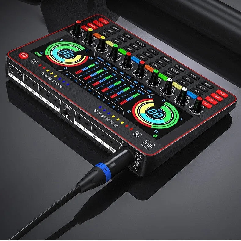 G4 professional sound card mixer with colourful LCD display, connected microphone, and included cables and remote control.