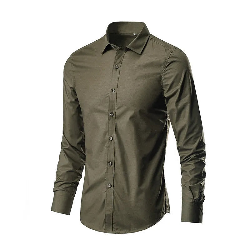 Man wearing a loose fit long-sleeve linen shirt in a neutral colour, showcasing the casual silhouette.