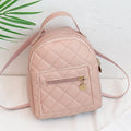 Girls' hard-shell vertical square backpack with embroidery in pink, showing front view and soft carry handle.