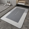 Blue oval blended fabric bathroom floor mat on a tiled floor