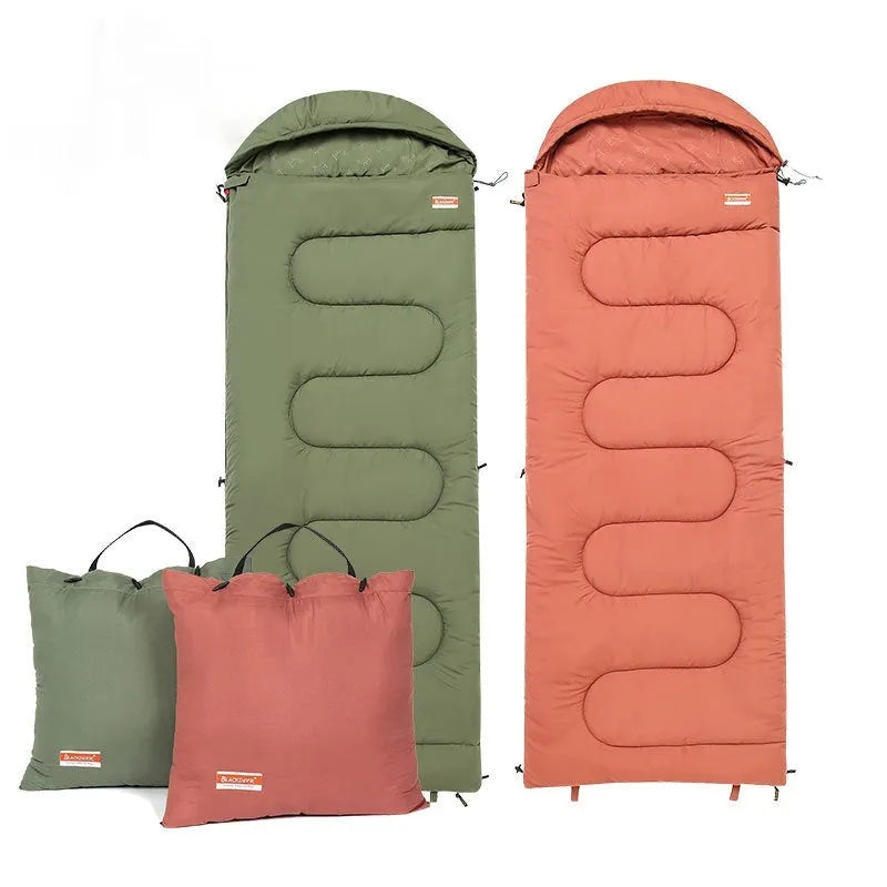 Outdoor cotton sleeping bag in ochre or olive green colour folded for portability