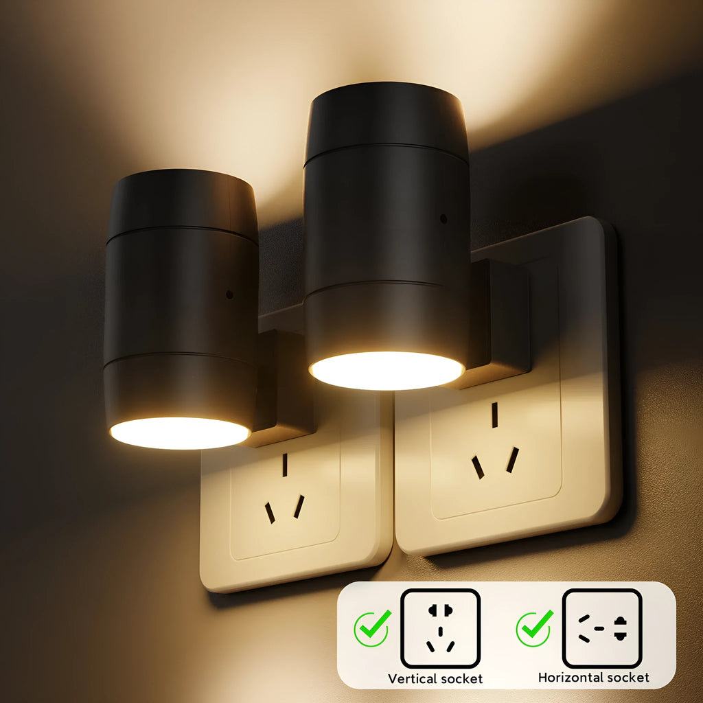 Small white induction night lamp with adjustable brightness dial and rotatable head plugged directly into wall socket