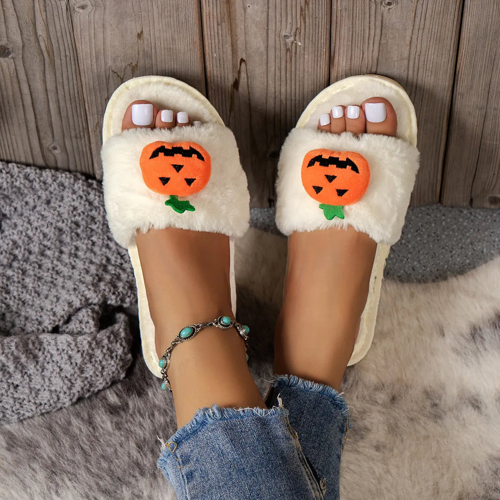 Women's Halloween pumpkin plush slippers in white and yellow with synthetic fur upper