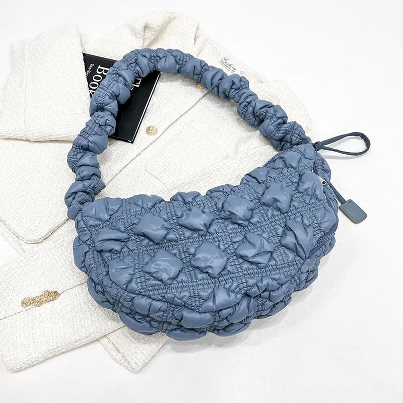 Women's nylon shoulder messenger bag in beige colour showing adjustable strap and dimensions