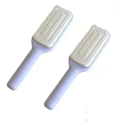 Roland purple and lunar rock grey self-cleaning hair brush with anti-static massage comb teeth.