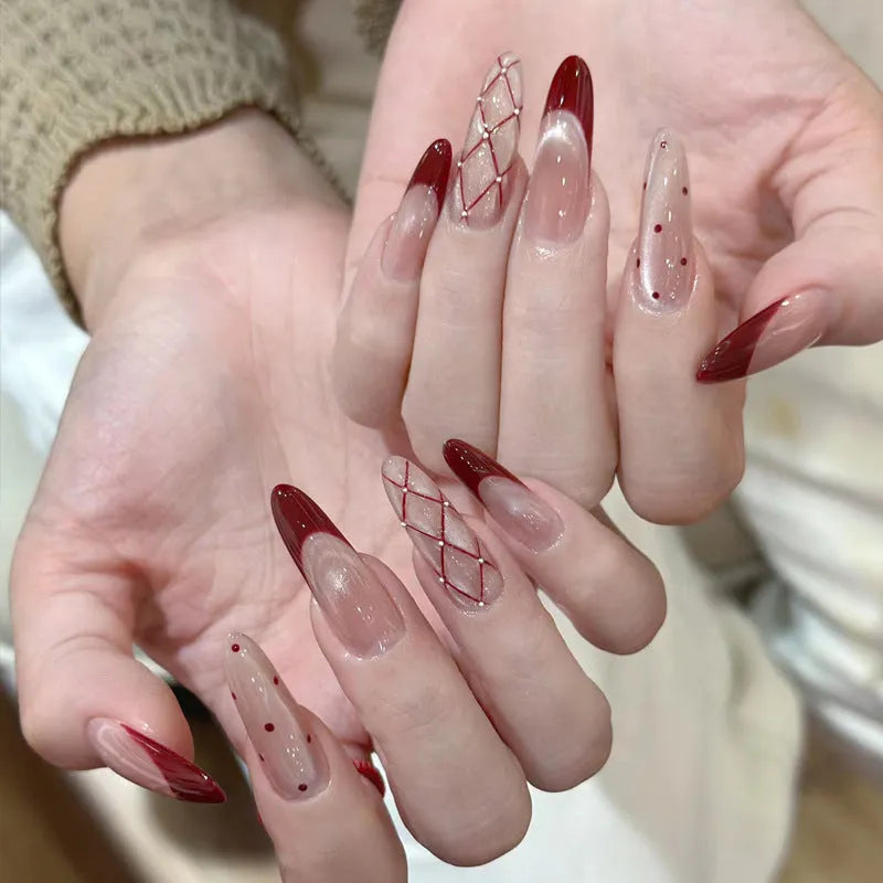 A set of artificial press-on false nails for women in assorted random colours and patterns.