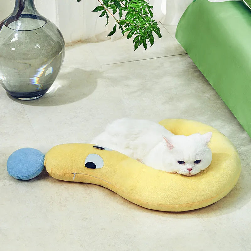 Blue and yellow rectangular pet sleeping pillow measuring 62 by 39 centimetres