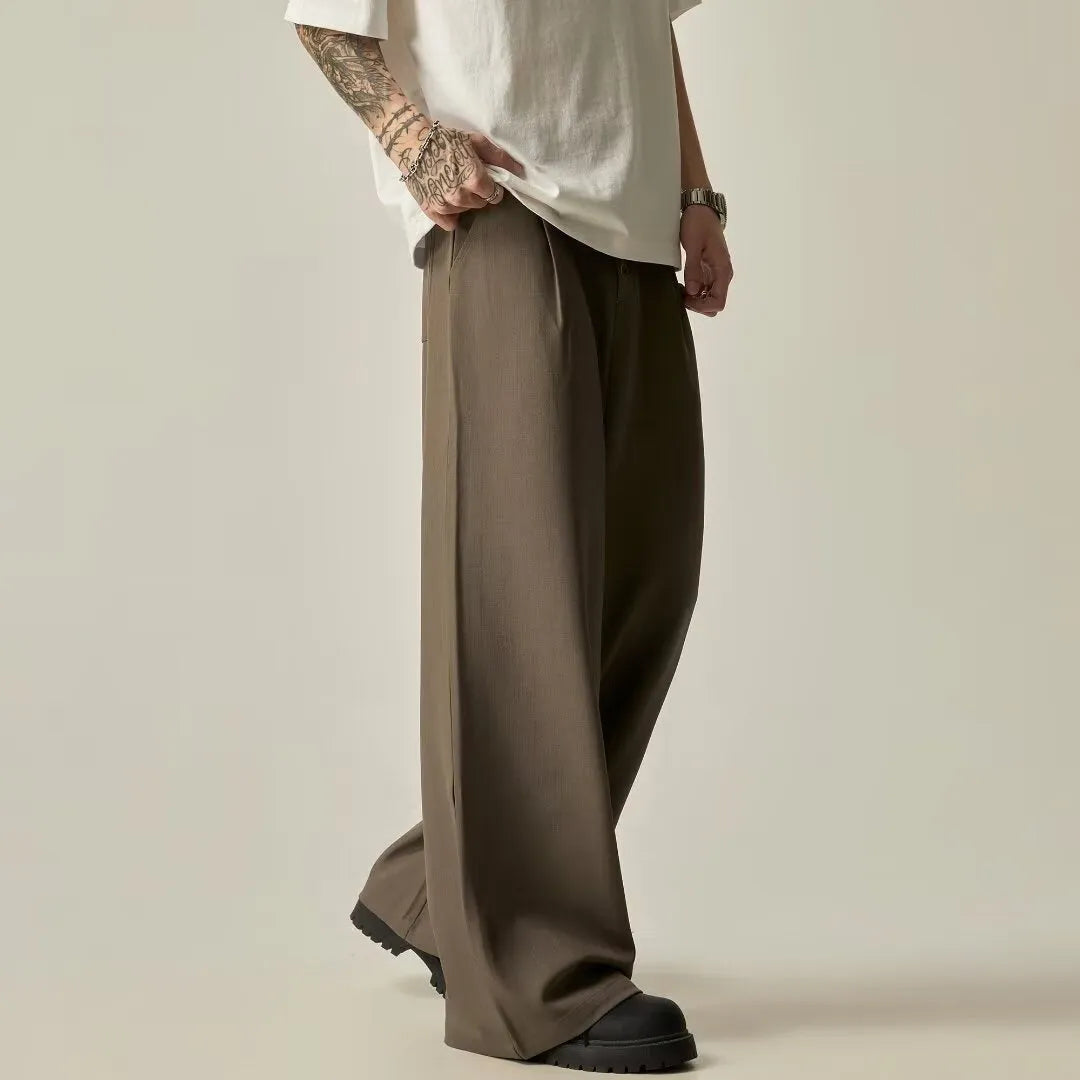 Men's black wide-leg casual trousers with straight cut and button fly detail
