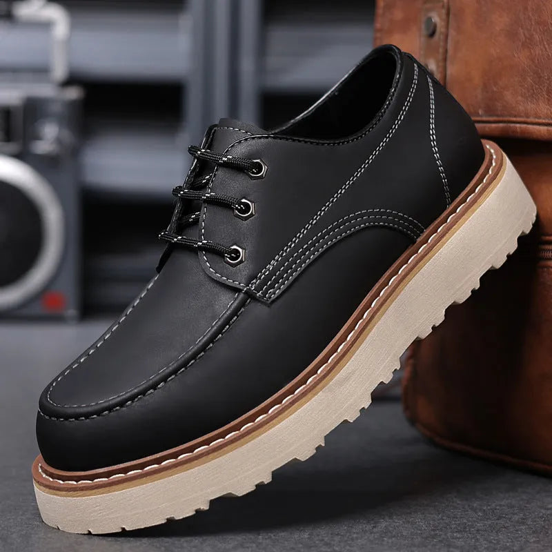 Men's black retro Martin-style low-top boots with round toe and non-slip rubber sole.