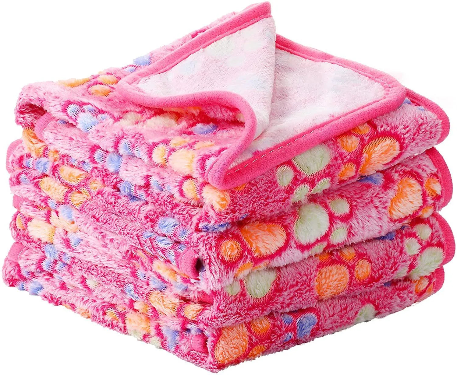 Coral fleece dog blanket with paw print design, shown in camel colour, laid flat.