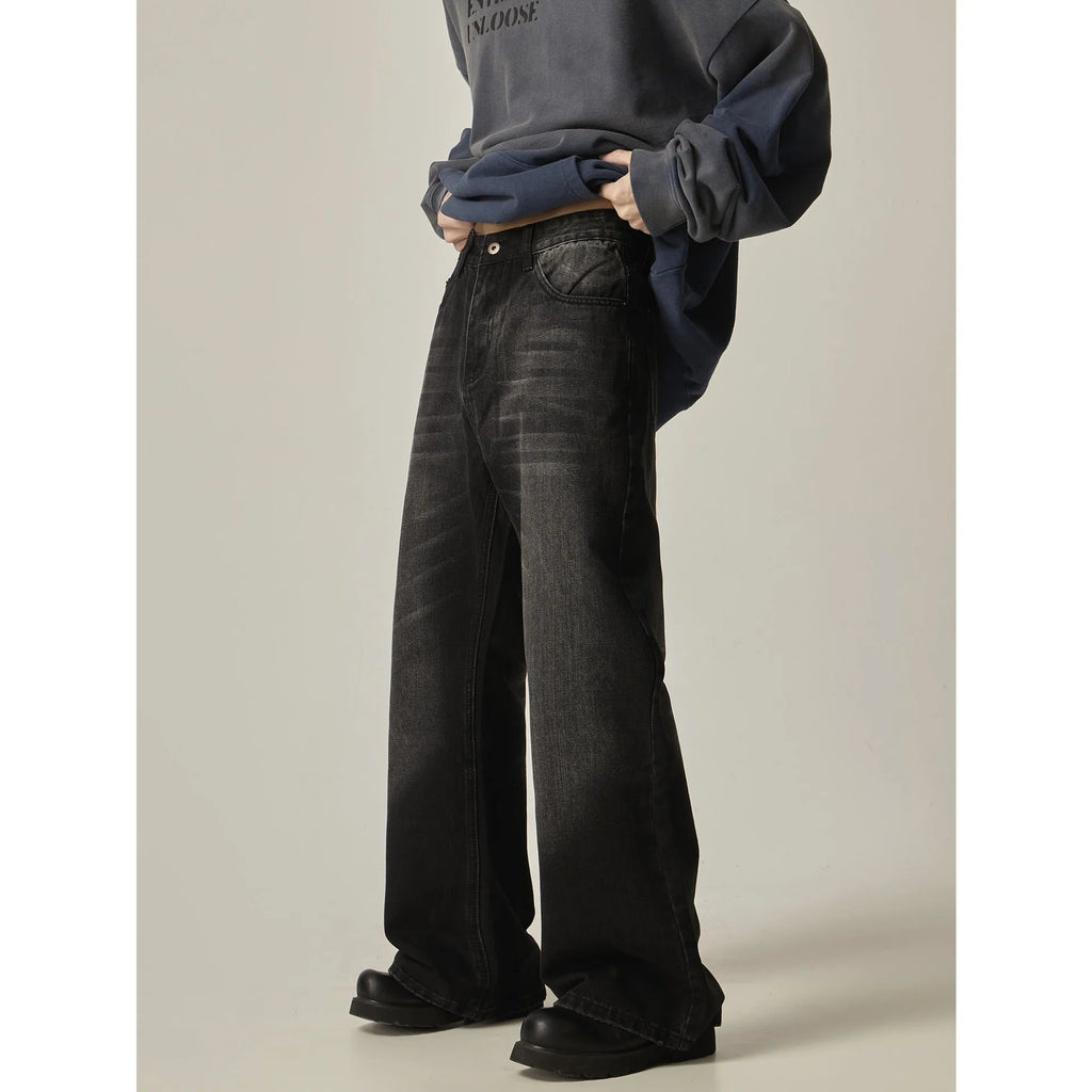Black retro straight-leg jeans with zip fly opening and loose fit on size chart