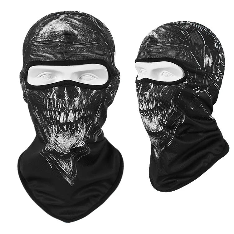 Breathable Bakool silk motorcycle skull mask in a graphic design, laid flat showing its 36cm by 29cm size.