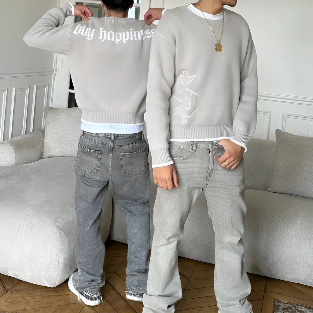 Grey jacquard knitwear coat with loose-fitting pullover style and long sleeves for autumn winter wear