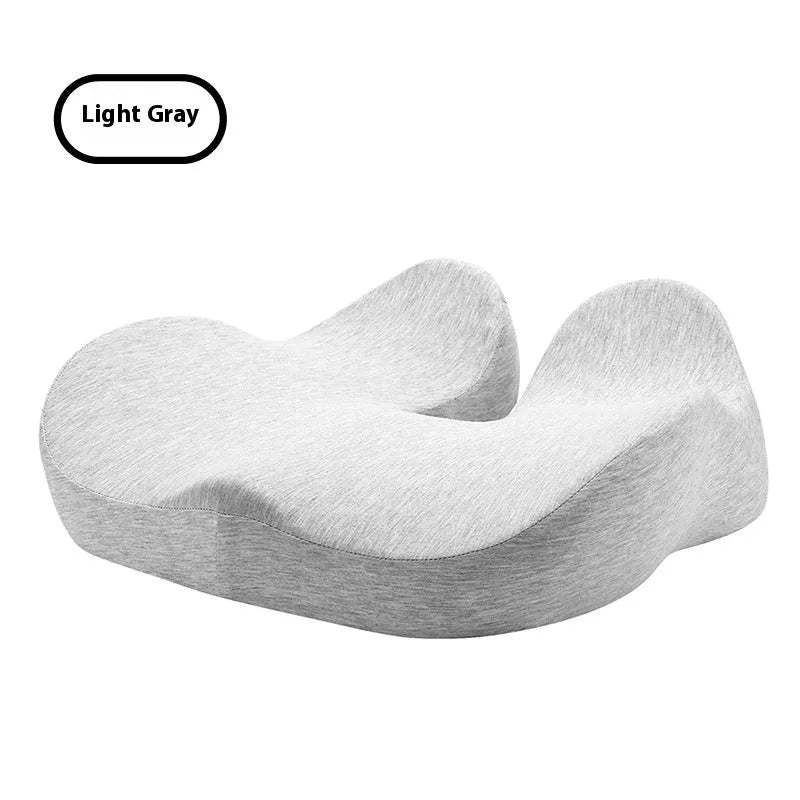 Memory foam seat cushion for office chairs in light grey colour on wooden chair