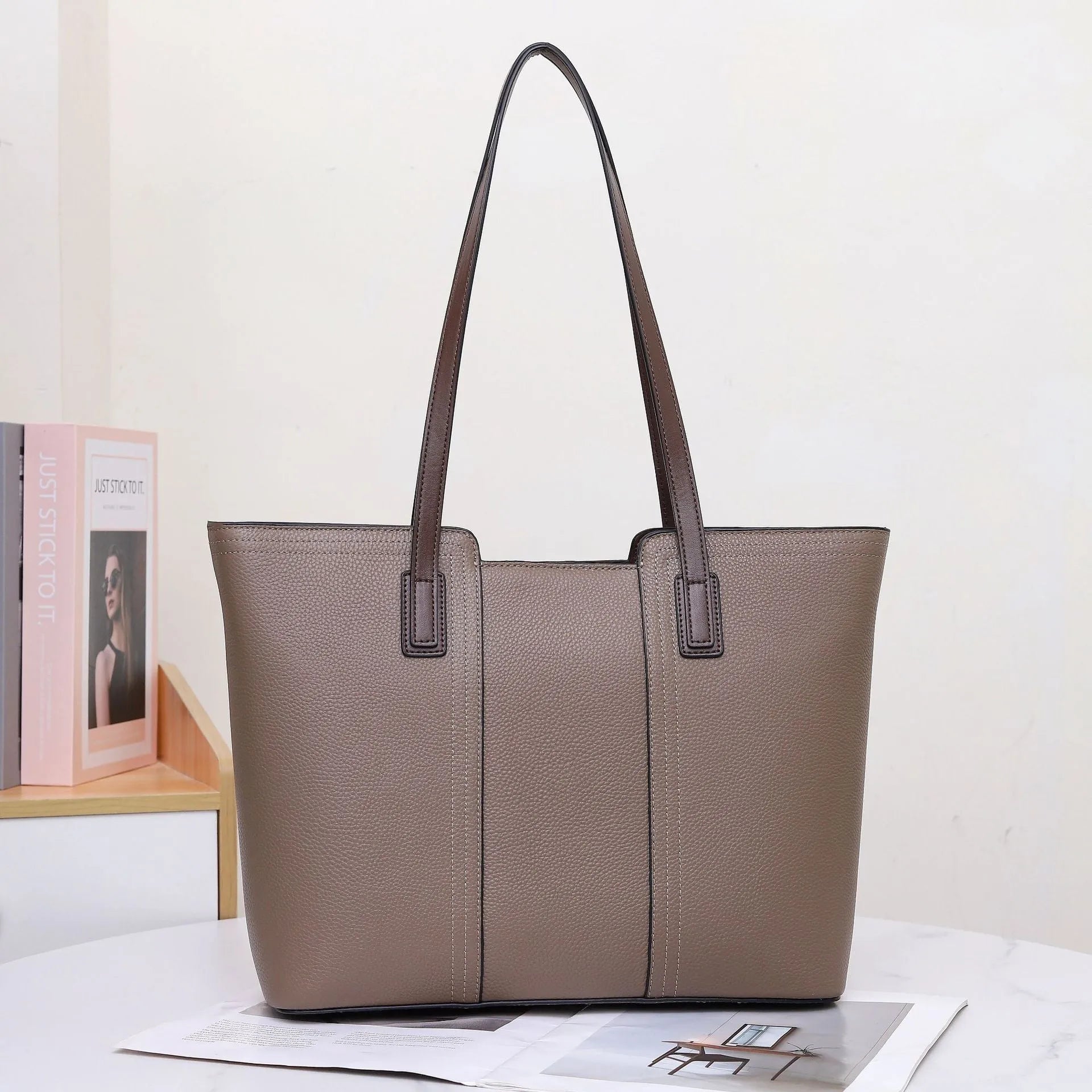 Genuine leather women's large shoulder bag in box-type design with sandwich pocket.