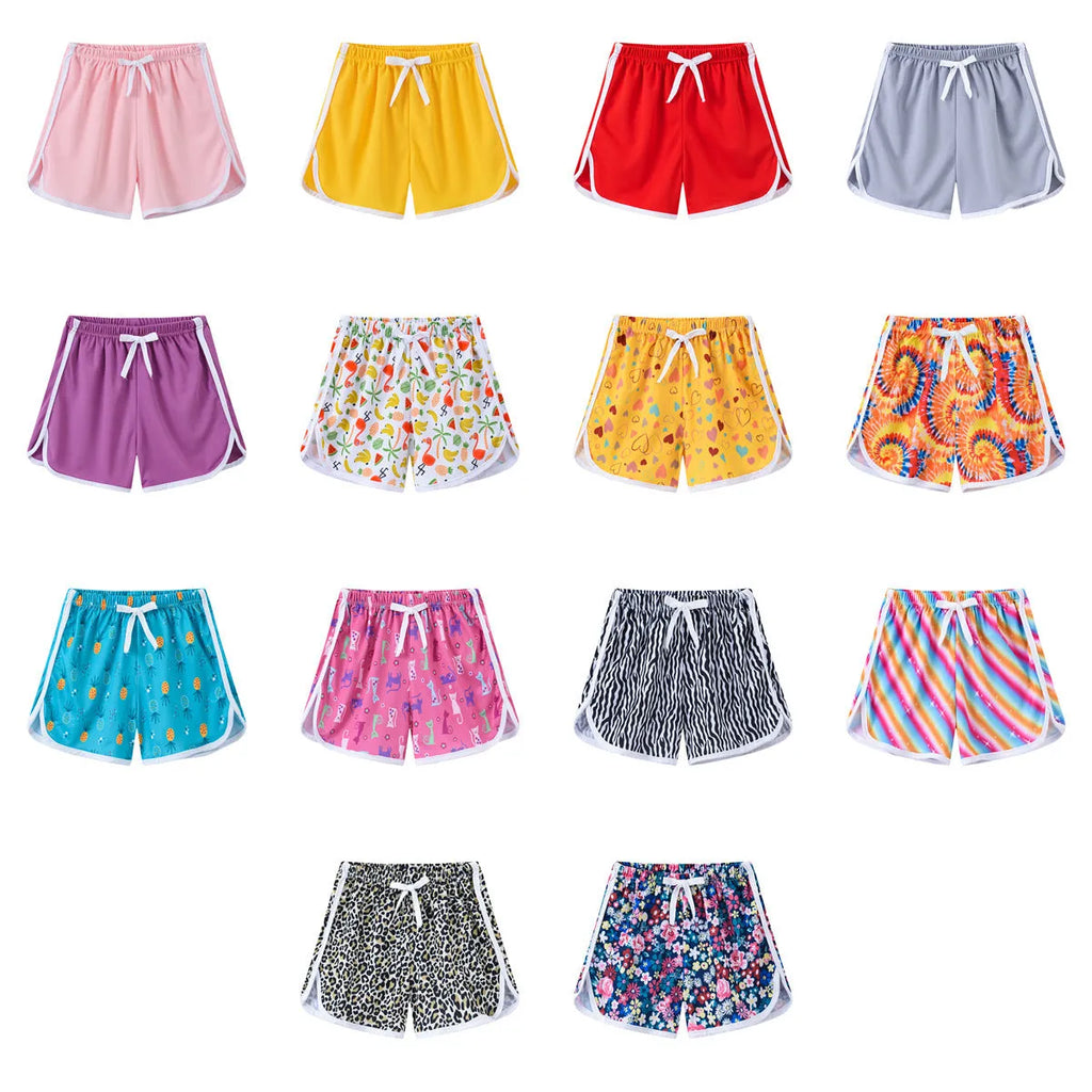 Children's casual polyester shorts in multiple colours including pink, leopard print and striped patterns