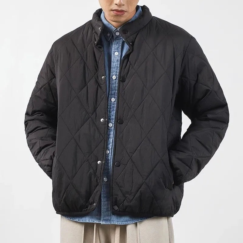 Men's black diamond pattern cotton-padded jacket with elongated length and loose urban style