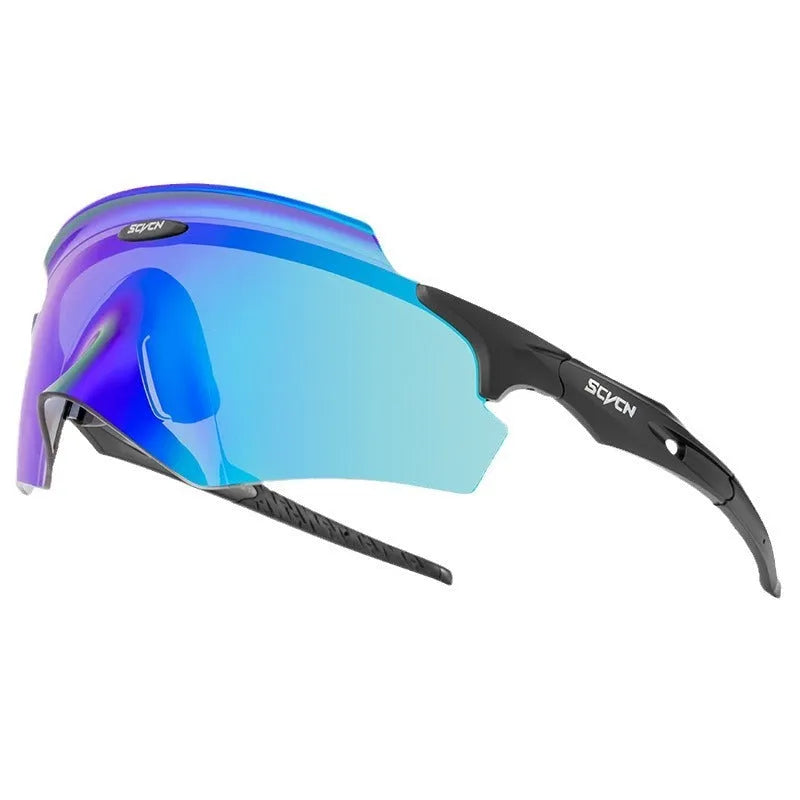 Frameless windproof sports goggles with a colourful integrated lens, shown in multiple style colours.