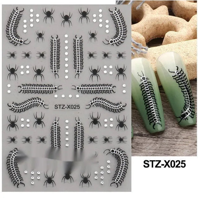 Sheet of black and silver love heart pattern nail art stickers with a plastic nail patch.