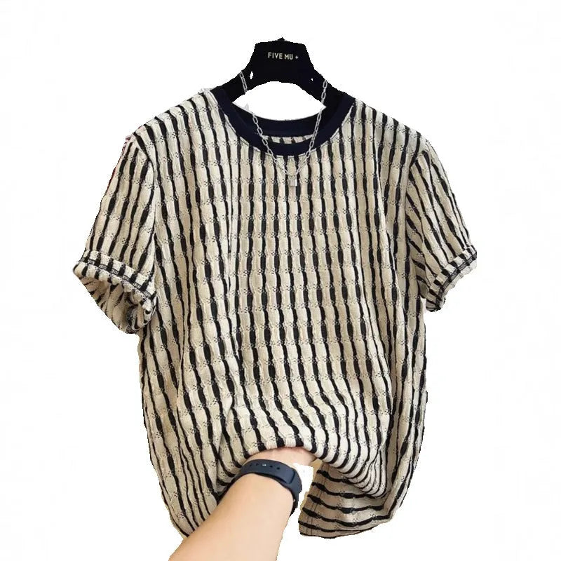 Men's black and white striped short sleeve linen shirt with loose fit pullover style displayed on flat lay