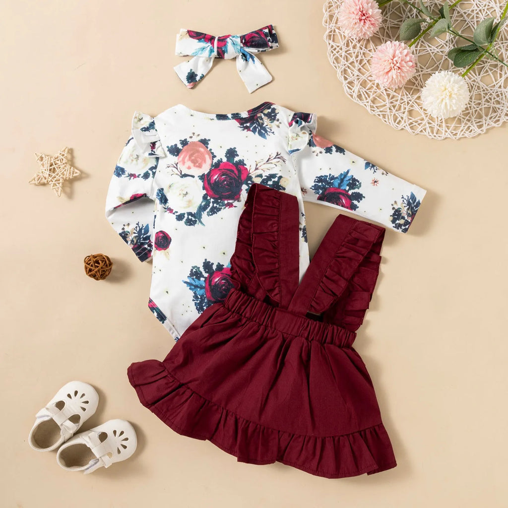 Pink cotton baby girl romper three-piece set with printed long-sleeved ruffled dress, strap skirt, and headdress