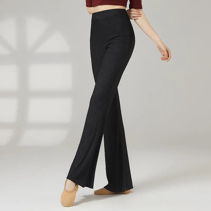 Women's solid colour dance practice trousers in polyester fabric for ballet training.