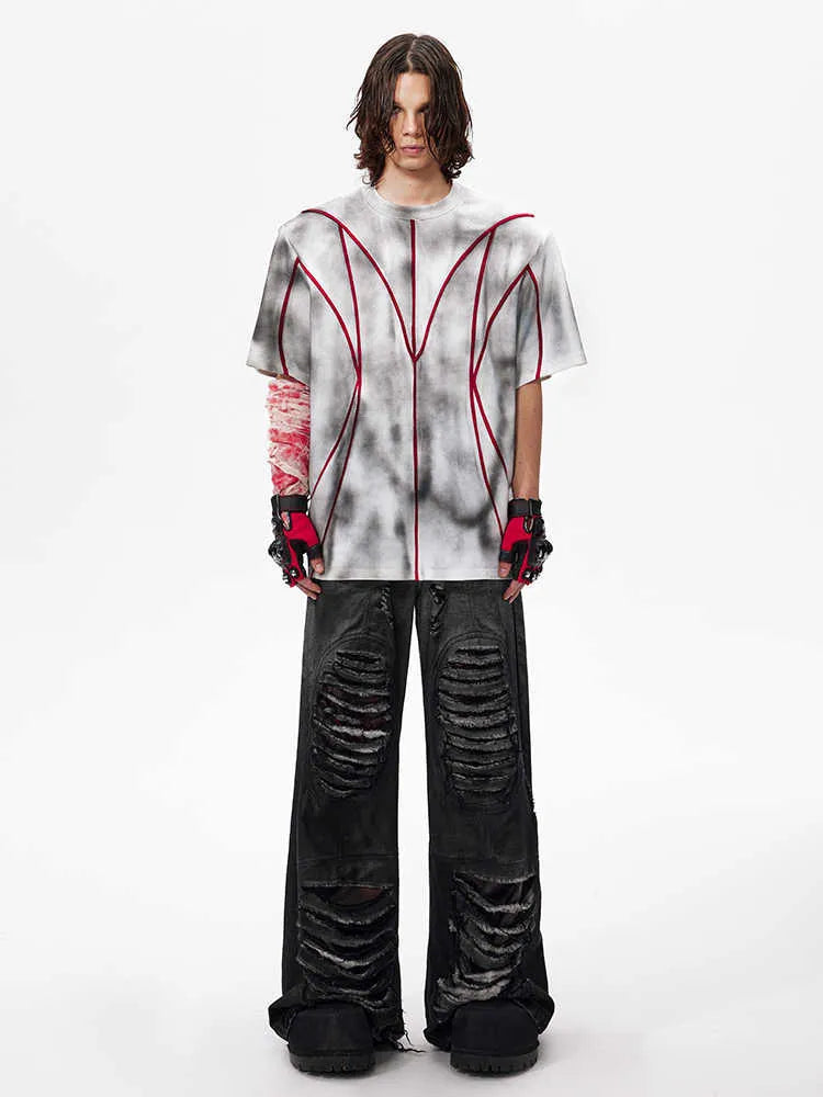 Short sleeve t-shirt with padded shoulders and three-dimensional line patchwork design on a round neck.