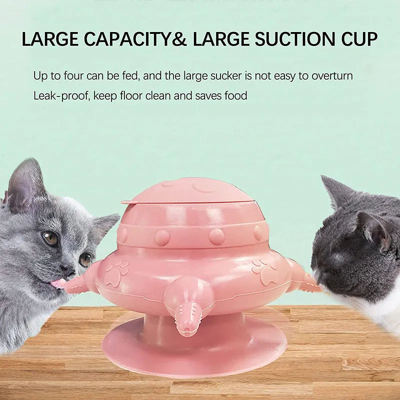 Pink silicone pet nursing device with milk bowl and four pacifiers for puppies and kittens.