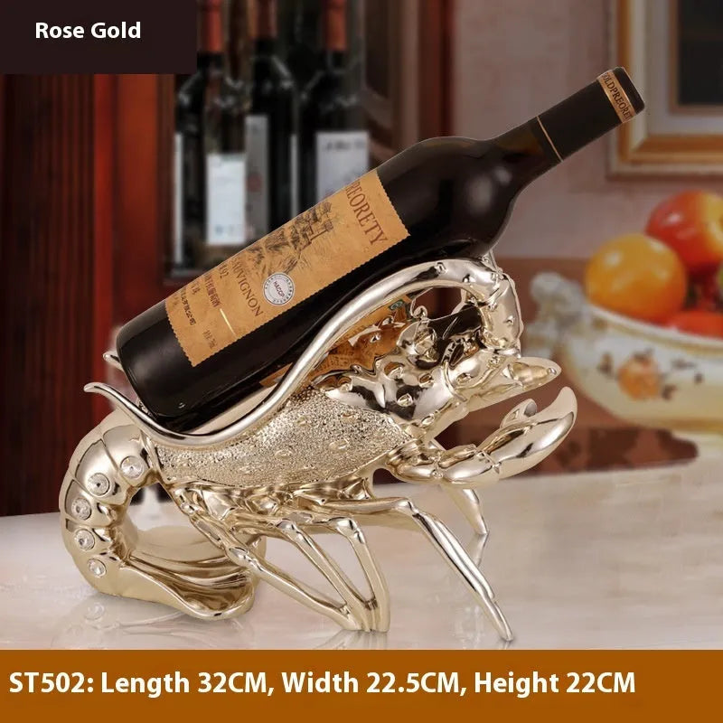 Lobster-shaped wine rack ornament in rose gold or silver, holding a single bottle.