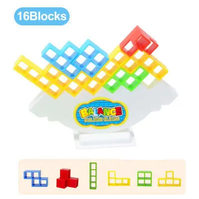 Plastic balance stacking game with 16 coloured building blocks, chassis, and base on a table