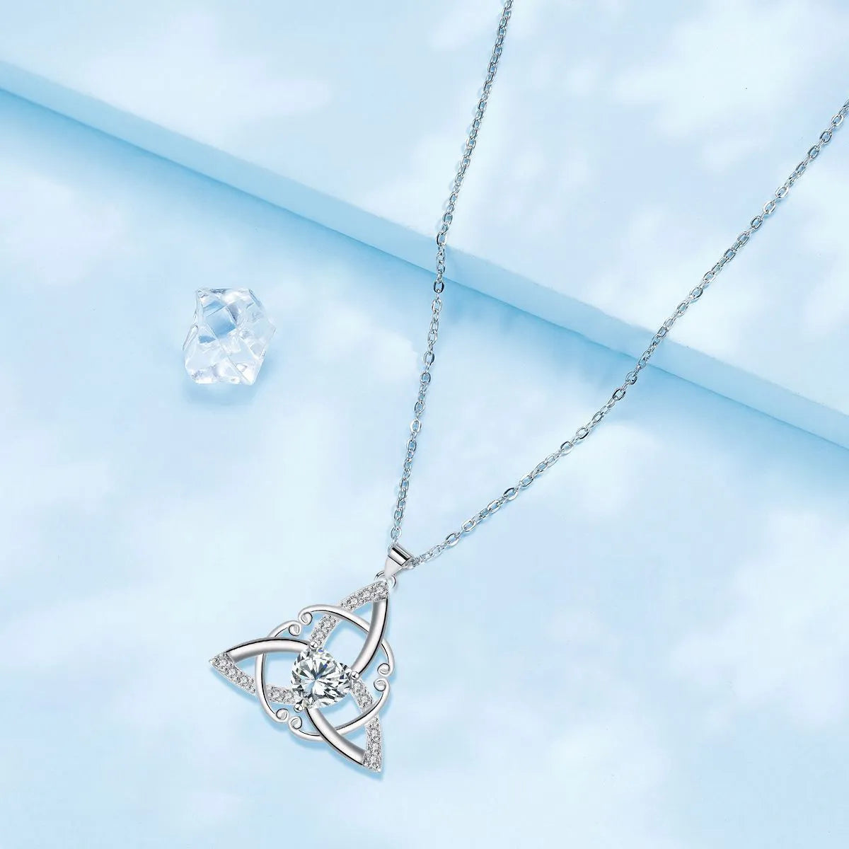 Geometric Celtic knot pendant necklace for women in solid copper with colour finish options.