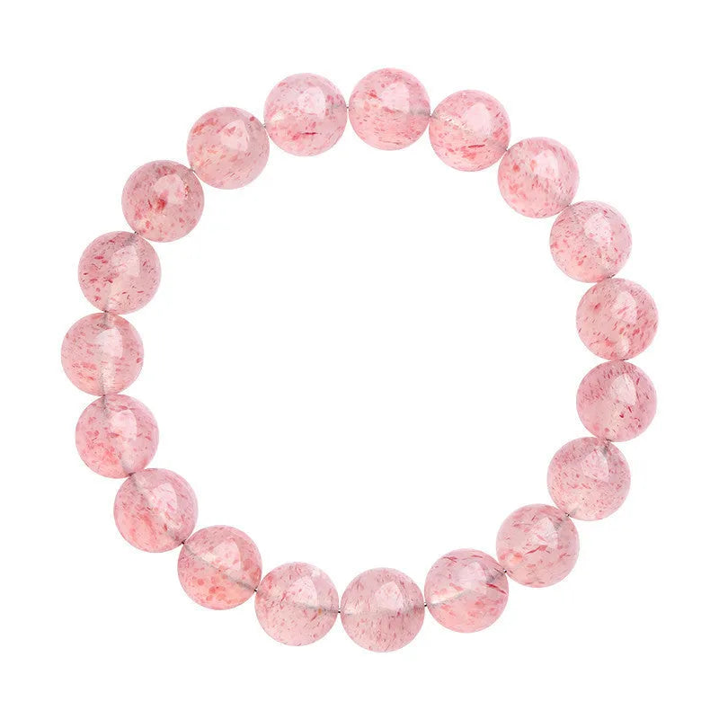 Natural strawberry quartz crystal bracelet with 19 round geometry beads on a white background.
