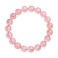 Natural strawberry quartz crystal bracelet with 19 round geometry beads on a white background.